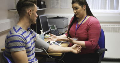 Healthcare professional with patient Healthcare professional with patient