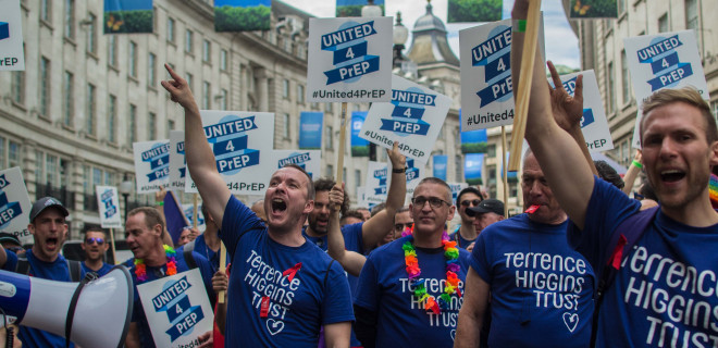 Pride marching with PrEP banners 