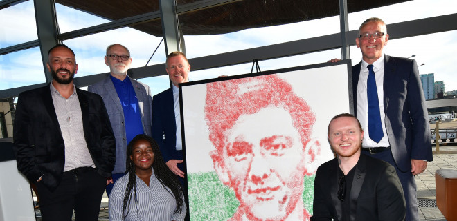 40 years of HIV at the Welsh Senedd group photo and Terry Higgins painting