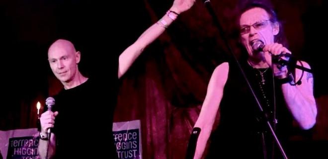 David Bowie fan charity event with men on stage singing