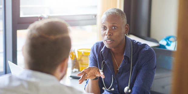 Doctor talking to patient