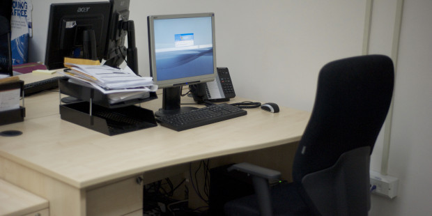 An office desk with computer